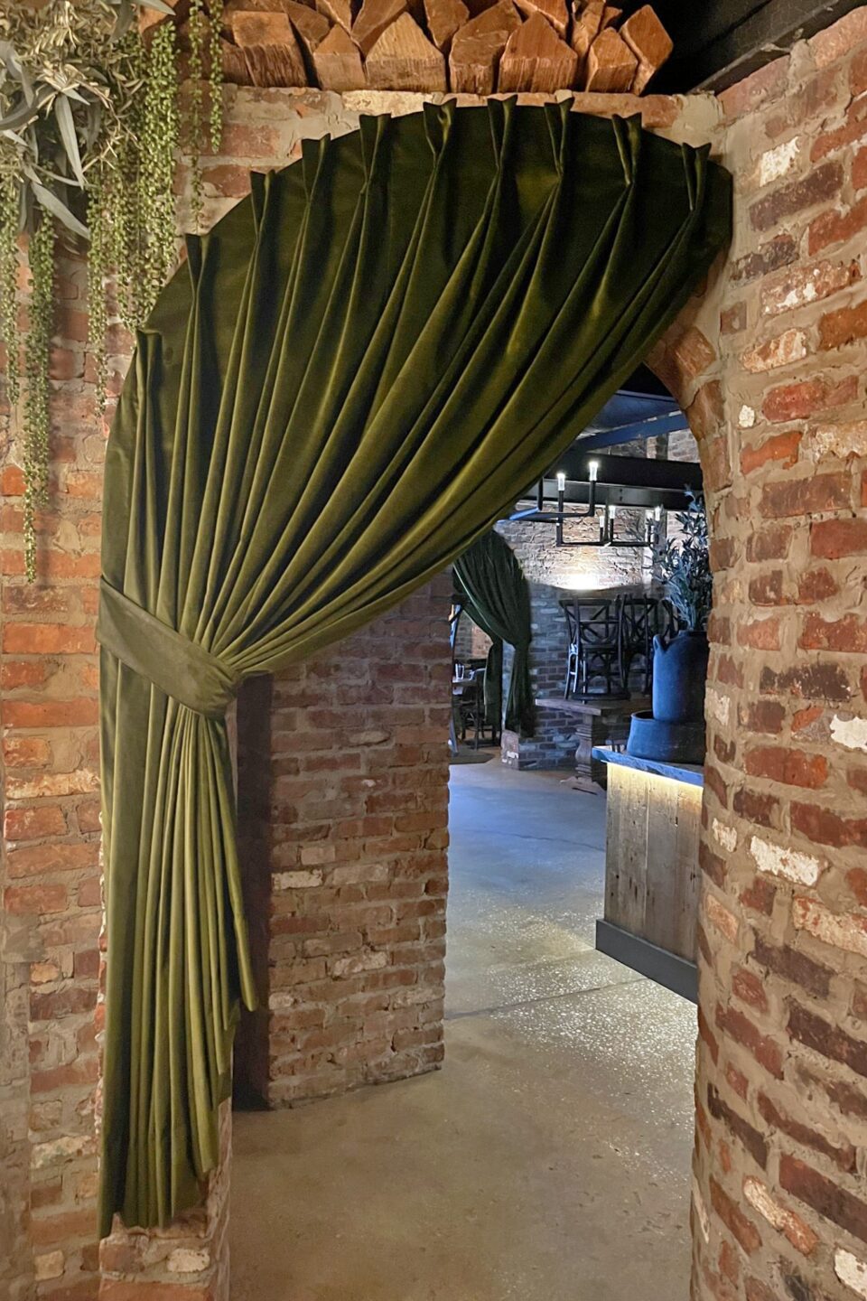 Two Finger Pinch Pleat Velvet Arched Drapery With Tie Back Restaurant Doorway Photo By John Lampone