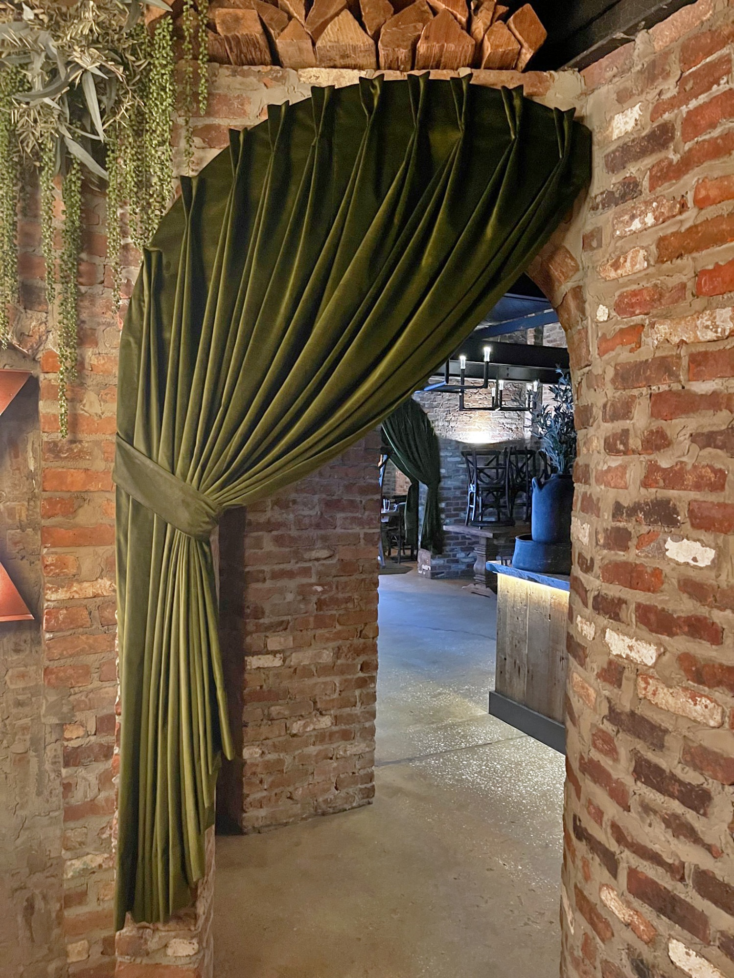 Two Finger Pinch Pleat Velvet Arched Drapery With Tie Back Restaurant Doorway Photo By John Lampone